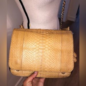 Nude snake skin purse